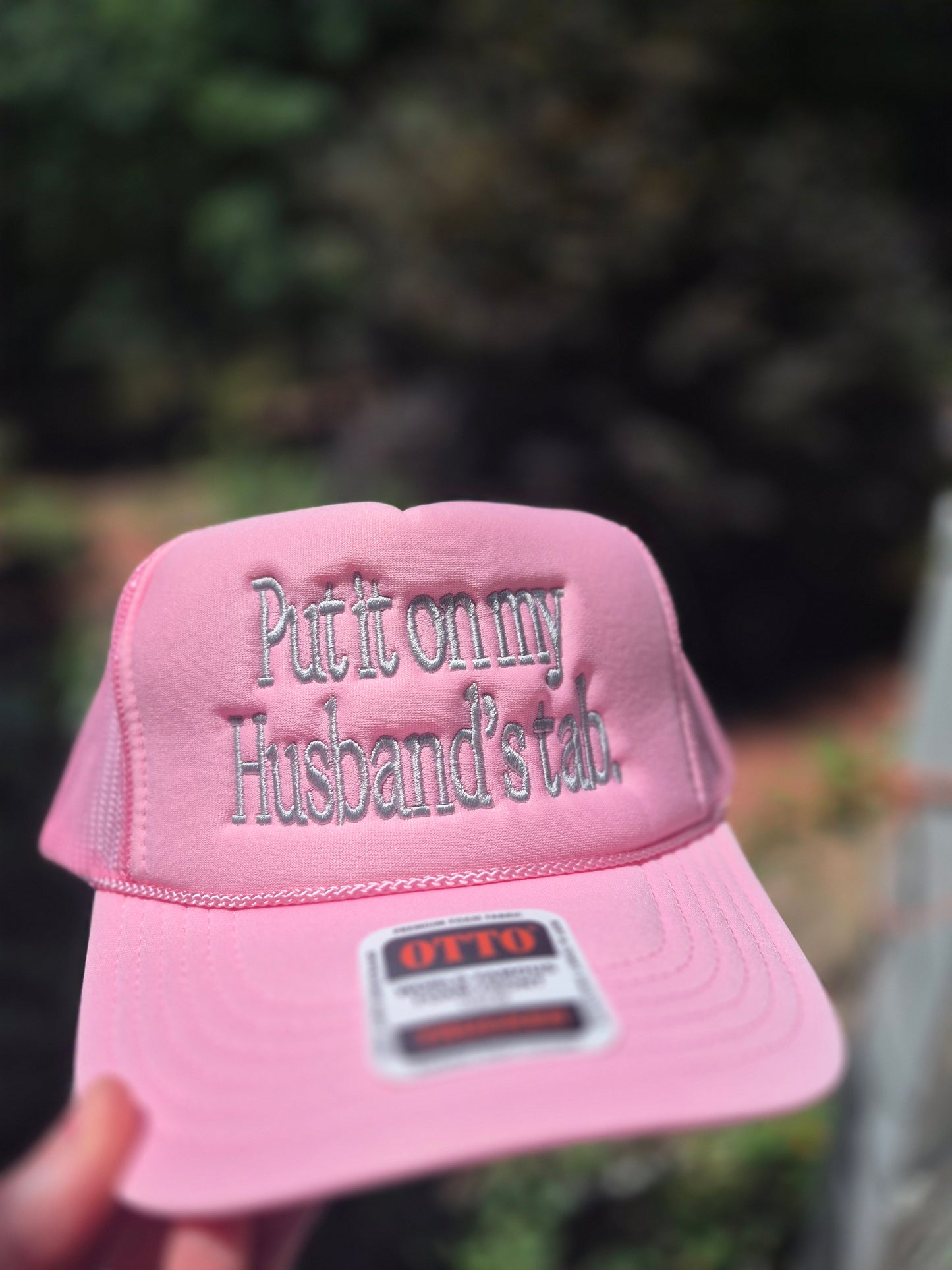 Put it on my husband's tab, trucker hat
