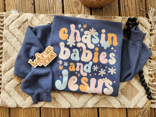Chasing babies & jesus crewneck sweatshirt