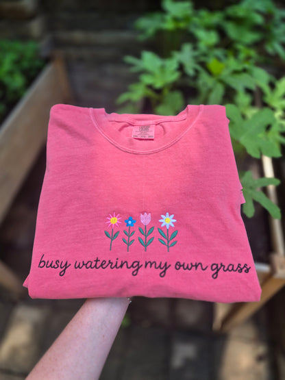 Busy watering my own grass - embroidery - cc tee & gildan crew