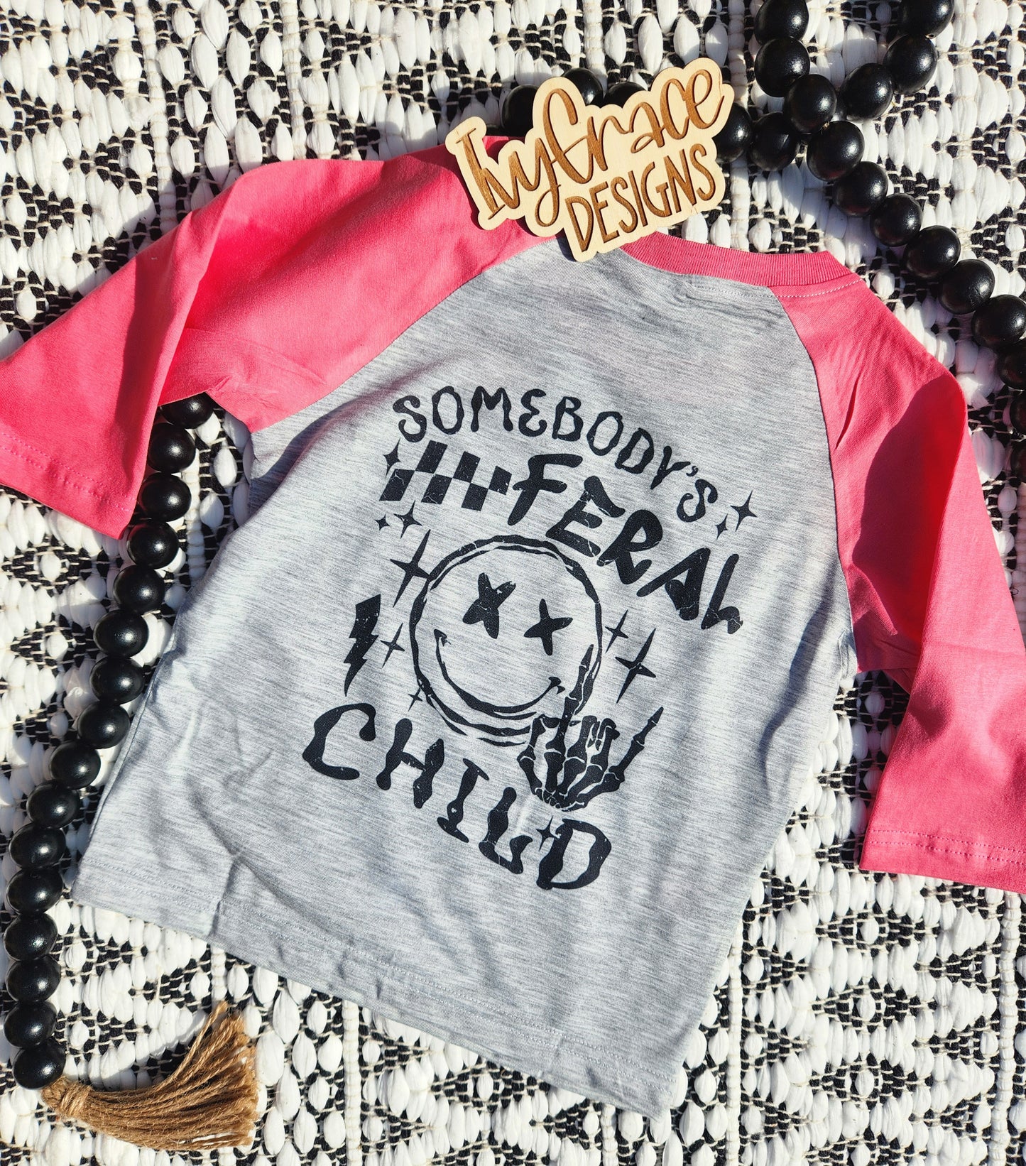 Somebody's feral child ⚡️ Raglan tees
