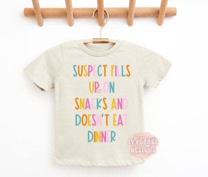 Suspect fills up on snacks 🤣 -toddler tee